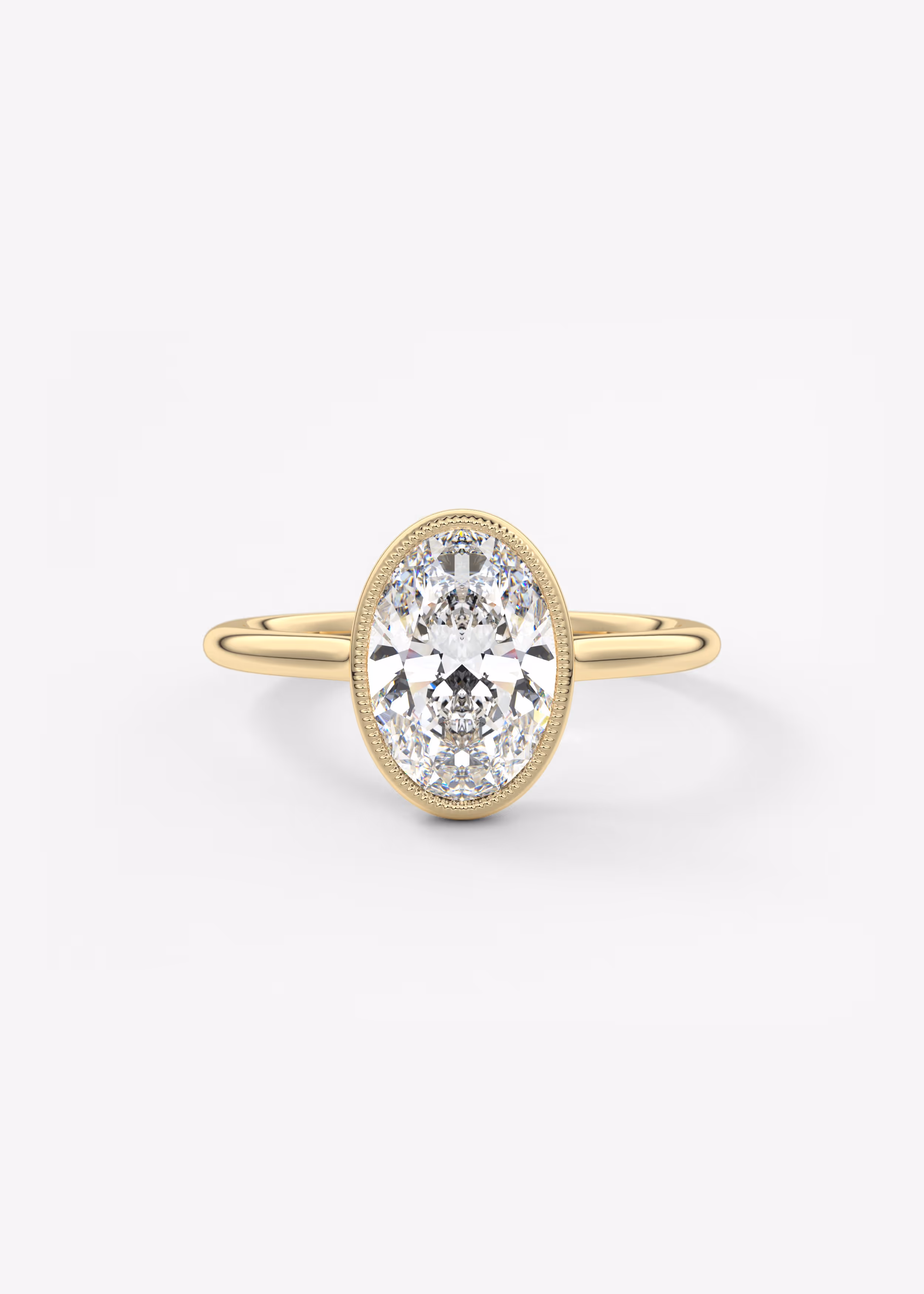 Vintage inspired oval bezel set Frank Darling diamond engagement ring with millgrain detailing and a low profile trellis basket in yellow gold