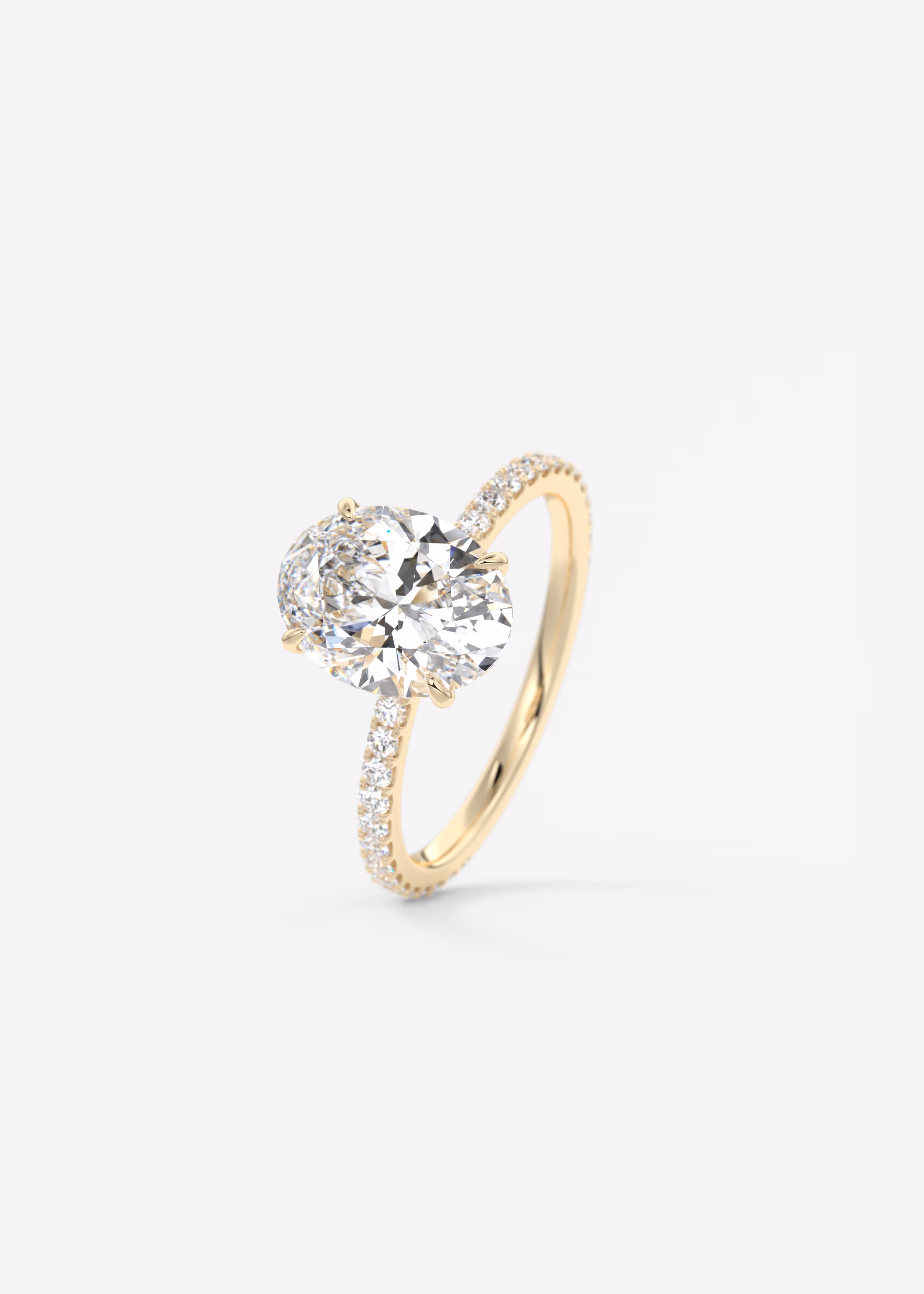 Oval Pavé Engagement Ring with thin band yellow gold